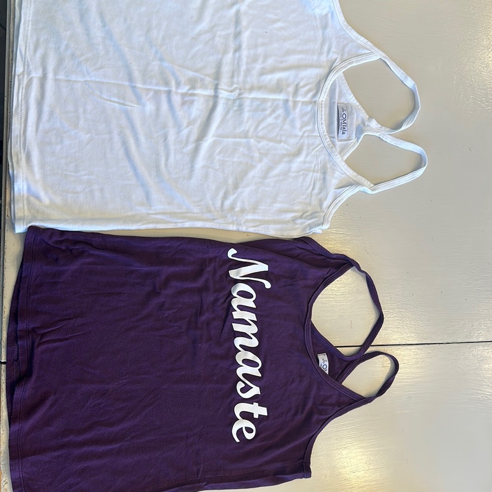 OM Lala tank tops in white and purple!